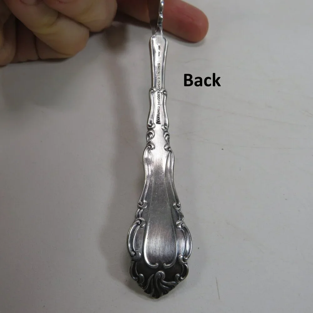 Webster Twisted Handle Butter Knife silver plated S.L. & G.H. Rogers Company A1